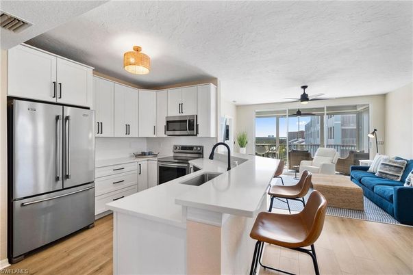 Dining room, Interior, Kitchen, Living room, Stainless Steel Appliances, Wood Texture Flooring