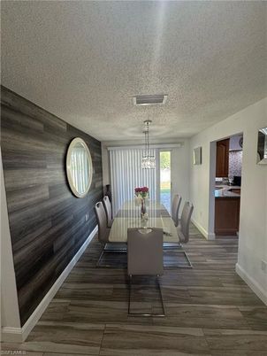 Chandelier, Dining room, Interior, Pendant Lights, Wood Texture Flooring, Wooden Walls