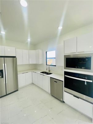 Interior, Kitchen, Marble, Recessed Lighting, Stainless Steel Appliances