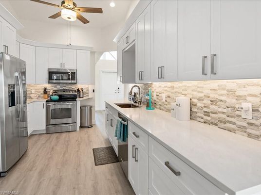 Interior, Kitchen, Recessed Lighting, Stainless Steel Appliances, Wood Texture Flooring