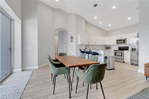 Dining room, Interior, Kitchen, Recessed Lighting, Stainless Steel Appliances, Wood Texture Flooring