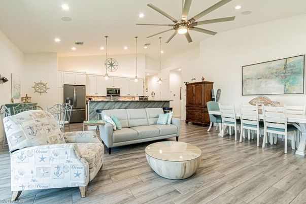 Dining room, Interior, Kitchen, Living room, Pendant Lights, Recessed Lighting, Stainless Steel Appliances, Wood Texture Flooring