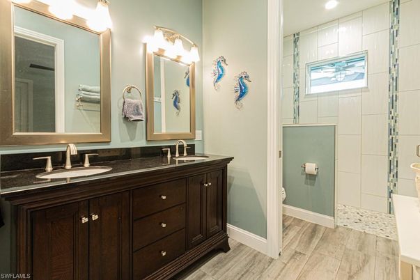 Bathroom, Dual Sink Vanities, Interior, Recessed Lighting, Wood Texture Flooring