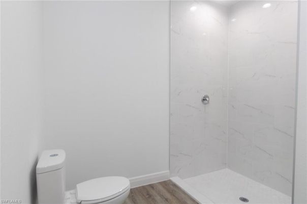Bathroom, Interior, Marble Walls, Recessed Lighting, Wood Texture Flooring