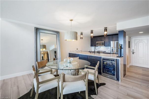 Dining room, Interior, Kitchen, Pendant Lights, Recessed Lighting, Stainless Steel Appliances, Wood Texture Flooring