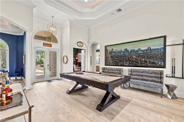 Billiard Table, Chandelier, Game Room, Interior, Pendant Lights, Recessed Lighting, Wood Texture Flooring
