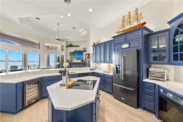 Interior, Kitchen, Pendant Lights, Recessed Lighting, Stainless Steel Appliances, Water, Wood Texture Flooring