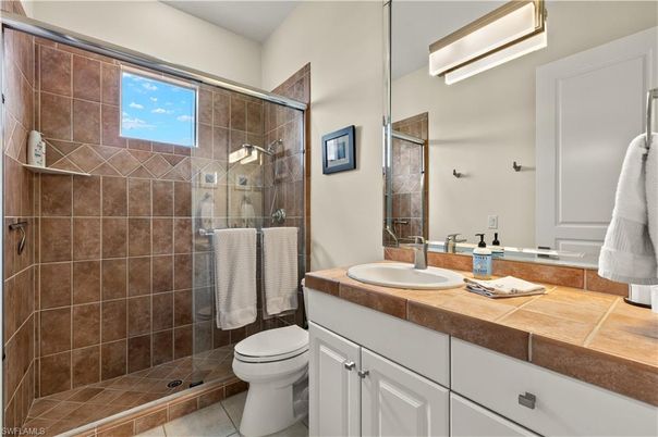 Bathroom, Dual Sink Vanities, Glass Shower, Interior, Tile Countertops