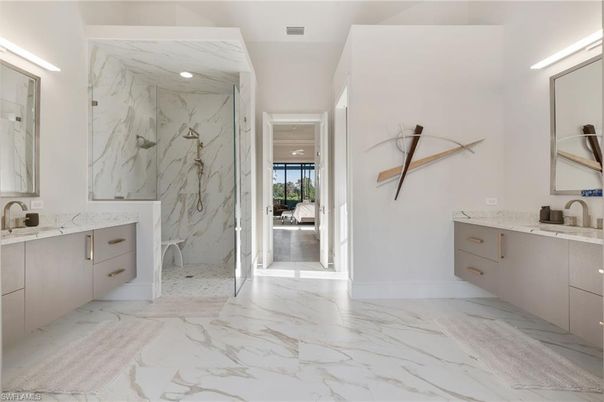Bathroom, Dual Sink Vanities, Interior, Marble, Marble Walls, Recessed Lighting