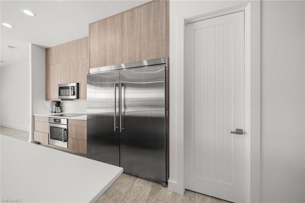 Interior, Kitchen, Recessed Lighting, Stainless Steel Appliances, Wood Texture Flooring