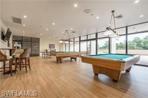Billiard Table, Chandelier, Game Room, Interior, Pendant Lights, Recessed Lighting, Wood Texture Flooring