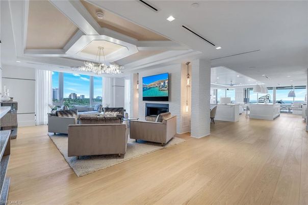 Chandelier, Fireplace, Interior, Living room, Pendant Lights, Recessed Lighting, Wood Texture Flooring
