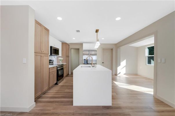 Interior, Kitchen, Pendant Lights, Recessed Lighting, Stainless Steel Appliances, Wood Texture Flooring