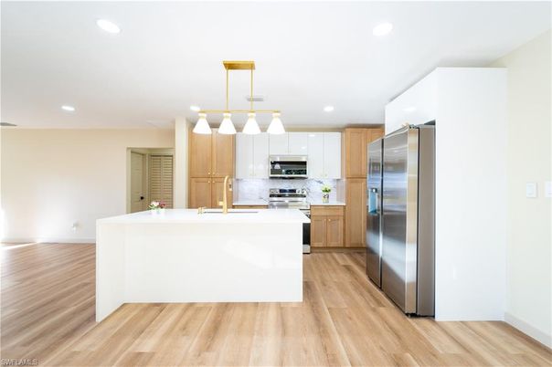 Interior, Kitchen, Pendant Lights, Recessed Lighting, Stainless Steel Appliances, Wood Texture Flooring
