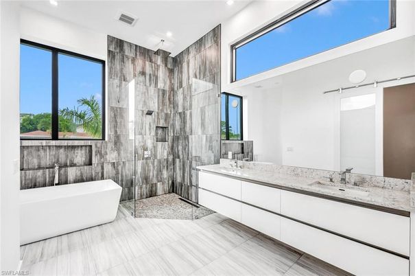 Bathroom, Dual Sink Vanities, Free Standing Baths, Interior, Marble Walls, Recessed Lighting