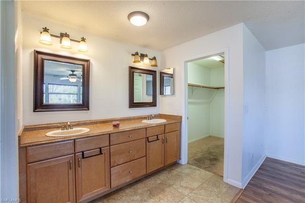 Bathroom, Dual Sink Vanities, Interior, Walk-in Closets, Wood Texture Flooring