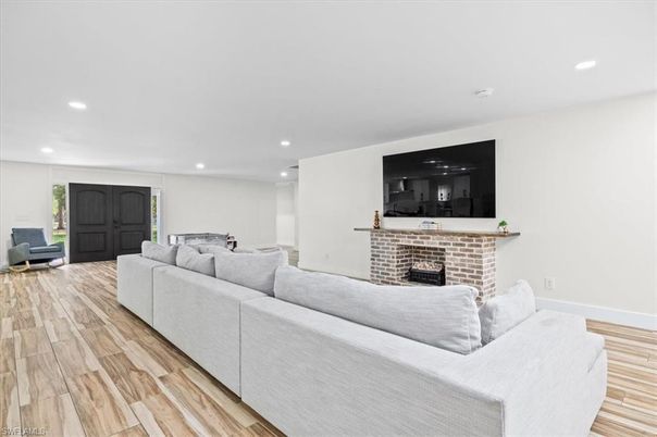 Fireplace, Interior, Living room, Recessed Lighting, Wood Texture Flooring