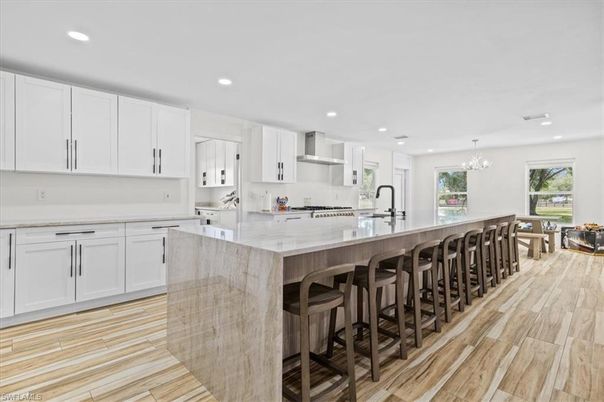 Chandelier, Interior, Kitchen, Recessed Lighting, Stainless Steel Appliances, Wood Texture Flooring