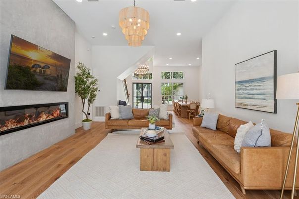 Chandelier, Fireplace, Interior, Living room, Recessed Lighting, Wood Texture Flooring