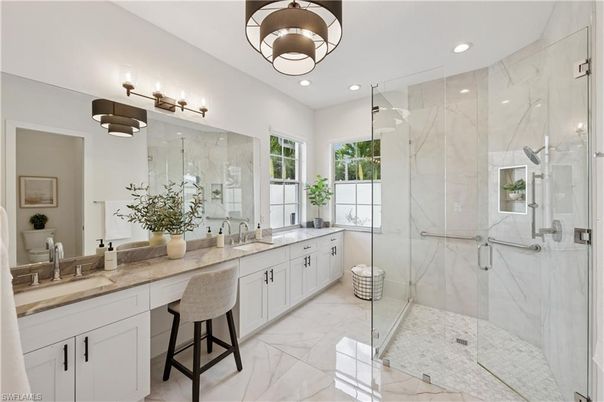Bathroom, Dual Sink Vanities, Glass Shower, Interior, Marble, Marble Walls, Recessed Lighting