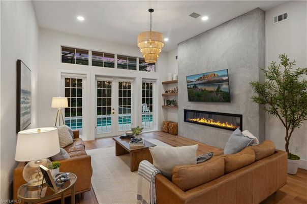 Chandelier, Fireplace, Interior, Living room, Recessed Lighting, Wood Texture Flooring