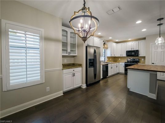 Chandelier, Interior, Kitchen, Pendant Lights, Recessed Lighting, Stainless Steel Appliances, Wood Texture Flooring