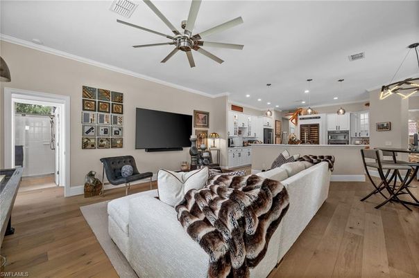 Dining room, Interior, Kitchen, Living room, Pendant Lights, Recessed Lighting, Stainless Steel Appliances, Wood Texture Flooring
