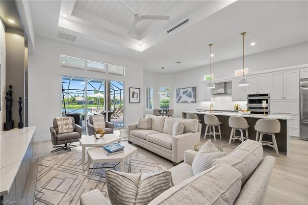 Dining room, Interior, Kitchen, Living room, Pendant Lights, Recessed Lighting, Stainless Steel Appliances, Wood Texture Flooring