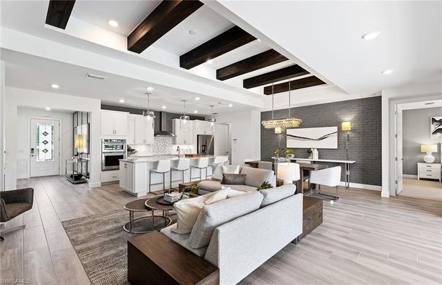 Dining room, Interior, Kitchen, Living room, Pendant Lights, Recessed Lighting, Stainless Steel Appliances, Wooden Beams, Wood Texture Flooring