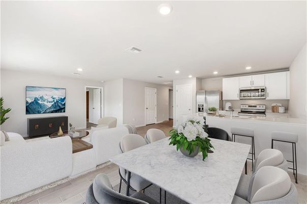 Dining room, Interior, Kitchen, Living room, Recessed Lighting, Stainless Steel Appliances, Wood Texture Flooring