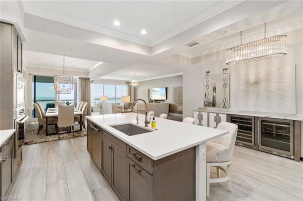 Chandelier, Dining room, Interior, Kitchen, Pendant Lights, Recessed Lighting, Water, Wood Texture Flooring
