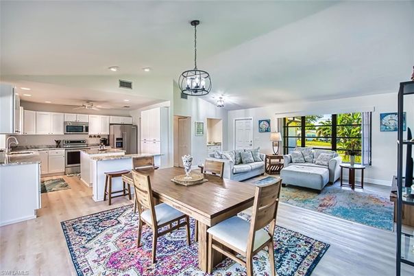 Dining room, Interior, Kitchen, Living room, Pendant Lights, Recessed Lighting, Stainless Steel Appliances, Wood Texture Flooring