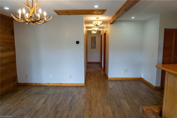 Chandelier, Empty room, Interior, Recessed Lighting, Wood Texture Flooring