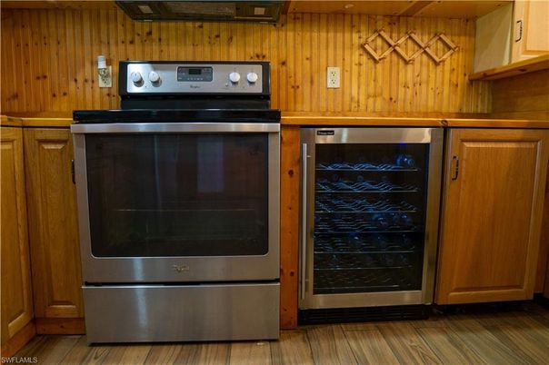 Interior, Kitchen, Stainless Steel Appliances, Wood Texture Flooring, Wooden Walls