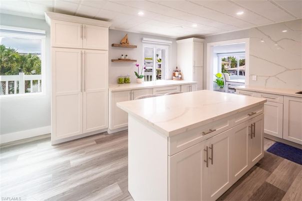 Interior, Kitchen, Marble Walls, Recessed Lighting, Wood Texture Flooring