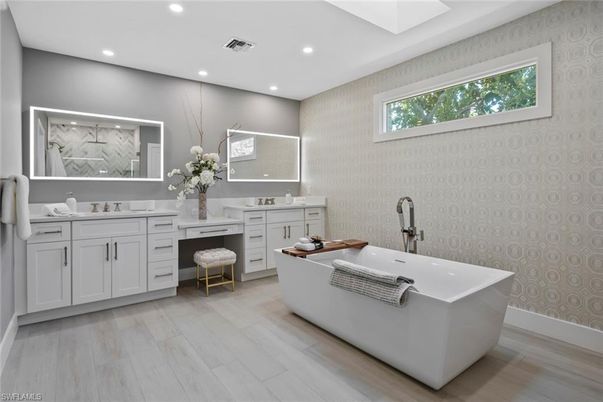 Bathroom, Dual Sink Vanities, Free Standing Baths, Interior, Recessed Lighting, Wood Texture Flooring