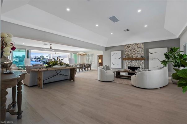 Dining room, Fireplace, Interior, Living room, Recessed Lighting, Wood Texture Flooring