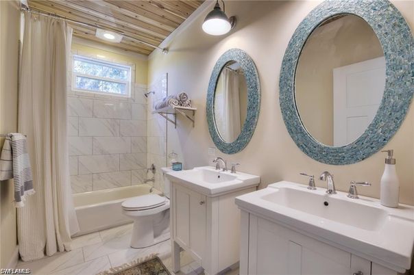 Bathroom, Dual Sink Vanities, Interior, Marble, Marble Walls, Recessed Lighting