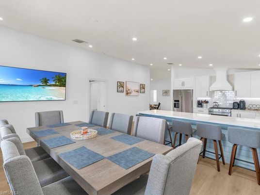 Dining room, Interior, Kitchen, Recessed Lighting, Stainless Steel Appliances, Wood Texture Flooring
