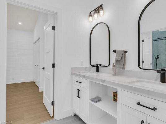 Bathroom, Dual Sink Vanities, Interior, Recessed Lighting, Wood Texture Flooring