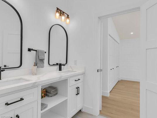Bathroom, Dual Sink Vanities, Interior, Recessed Lighting, Wood Texture Flooring