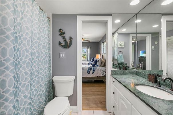 Bathroom, Bedroom, Dual Sink Vanities, Interior, Recessed Lighting, Wood Texture Flooring