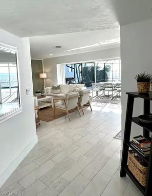 Dining room, Interior, Living room, Recessed Lighting, Water, Wood Texture Flooring