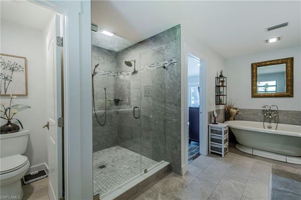 Bathroom, Free Standing Baths, Glass Shower, Interior, Marble Walls, Recessed Lighting