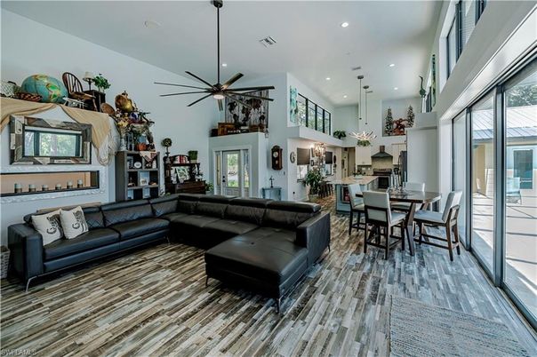 Dining room, Interior, Kitchen, Living room, Pendant Lights, Recessed Lighting, Stainless Steel Appliances, Wood Texture Flooring