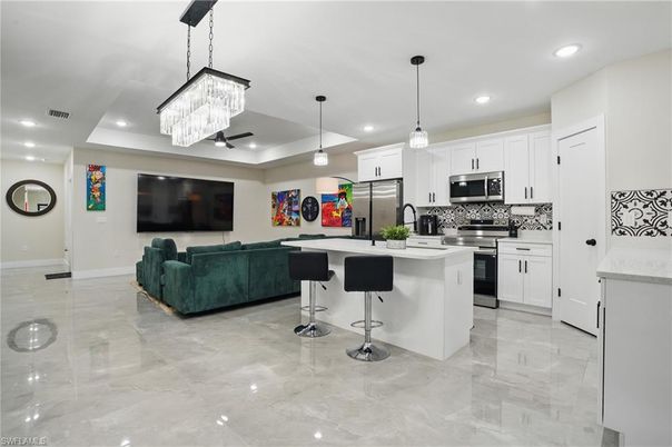 Chandelier, Interior, Kitchen, Living room, Pendant Lights, Recessed Lighting, Stainless Steel Appliances
