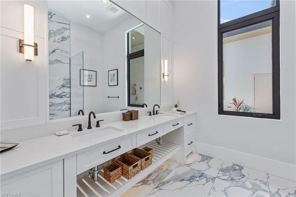 Bathroom, Dual Sink Vanities, Interior, Marble, Marble Walls, Recessed Lighting