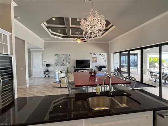 Chandelier, Dining room, Interior, Kitchen, Living room, Recessed Lighting, Wood Texture Flooring