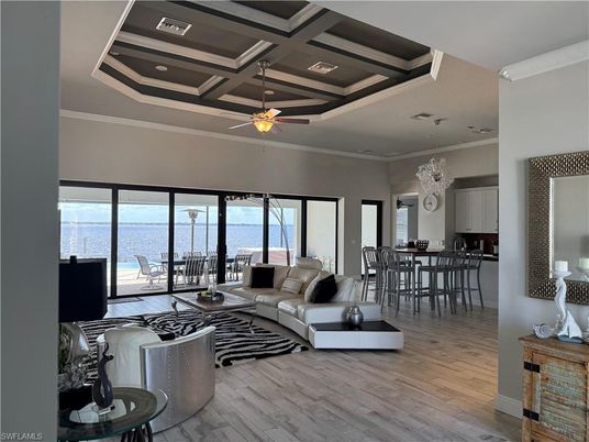 Dining room, Interior, Living room, Recessed Lighting, Water, Wood Texture Flooring