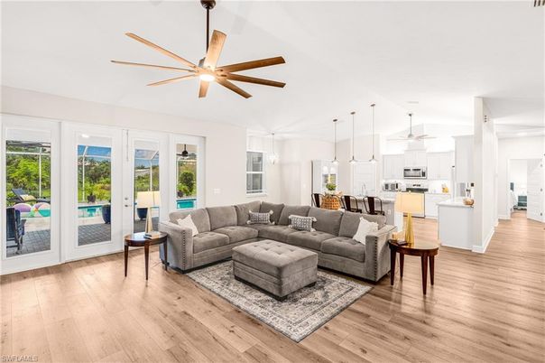 Dining room, Interior, Kitchen, Living room, Pendant Lights, Stainless Steel Appliances, Wood Texture Flooring
